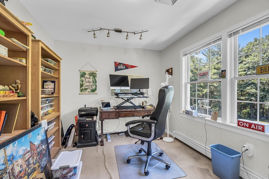 34 Pingry Way Ayer, MA 01432 - Photo 13 of 29 a view of a workspace with furniture and a window