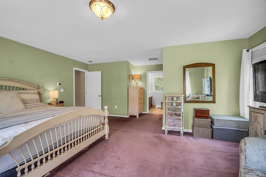 34 Pingry Way Ayer, MA 01432 - Photo 17 of 29 a bedroom with furniture and a window