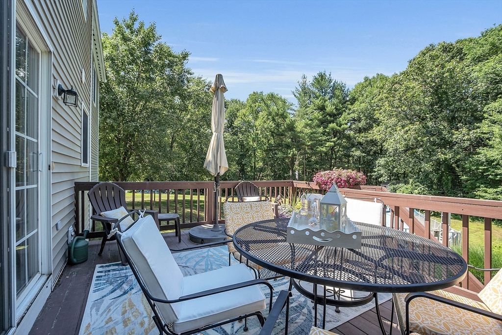 34 Pingry Way Ayer, MA 01432 - Photo 26 of 29 a view of a balcony with furniture