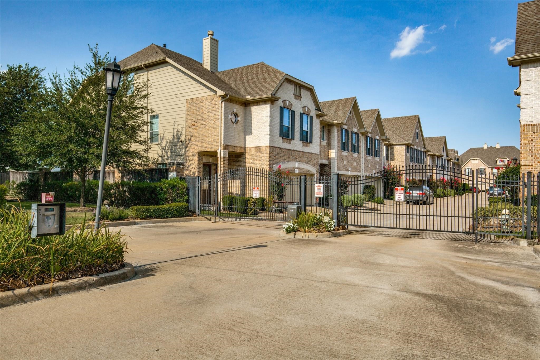 2711 Wallingford Pines Houston, TX 77042 - Photo 1 of 8 a view of multiple houses with a yard