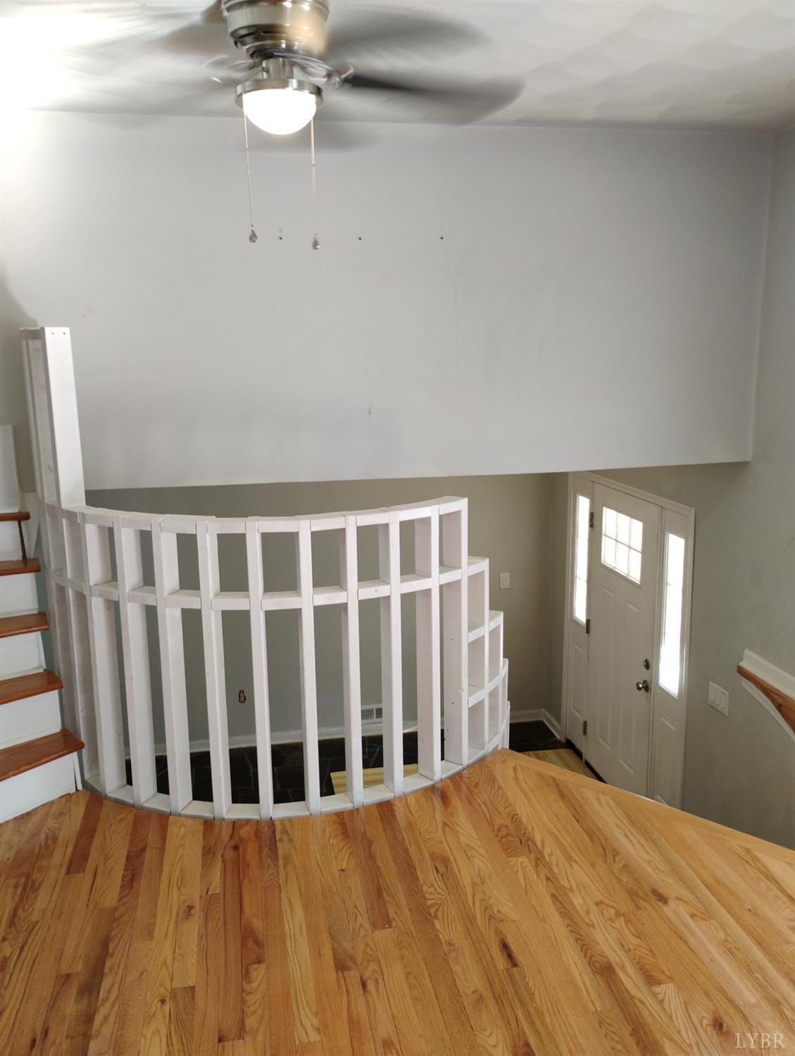 1316 Dudley Road Moneta, VA 24121 - Photo 24 of 61 VIEW STANDING IN LIVING ROOM LOOKING DOWN AT FRONT DOOR