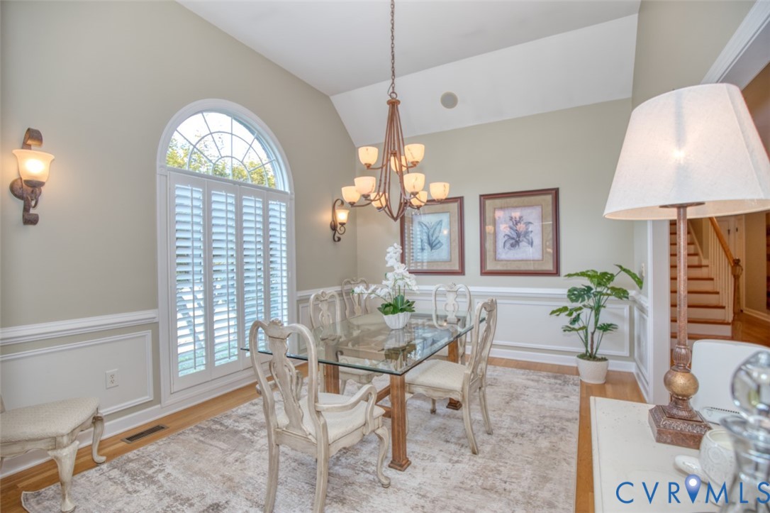 9960 Mill Pond Road Toano, VA 23168 - Photo 5 of 42 Vaulted ceiling with a chandelier, arched window w