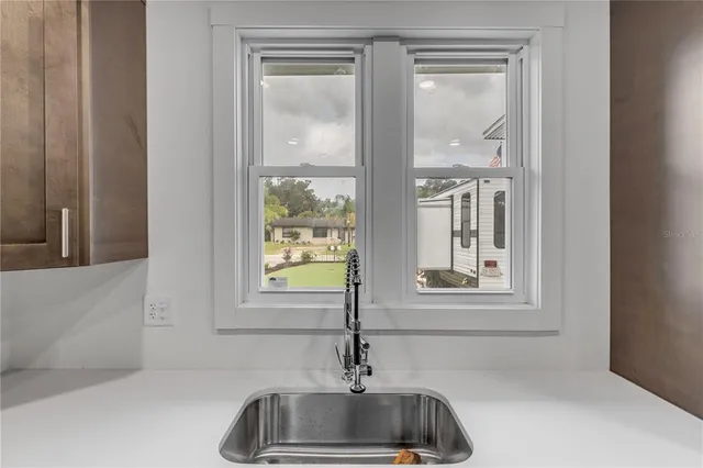 a sink and window in a room