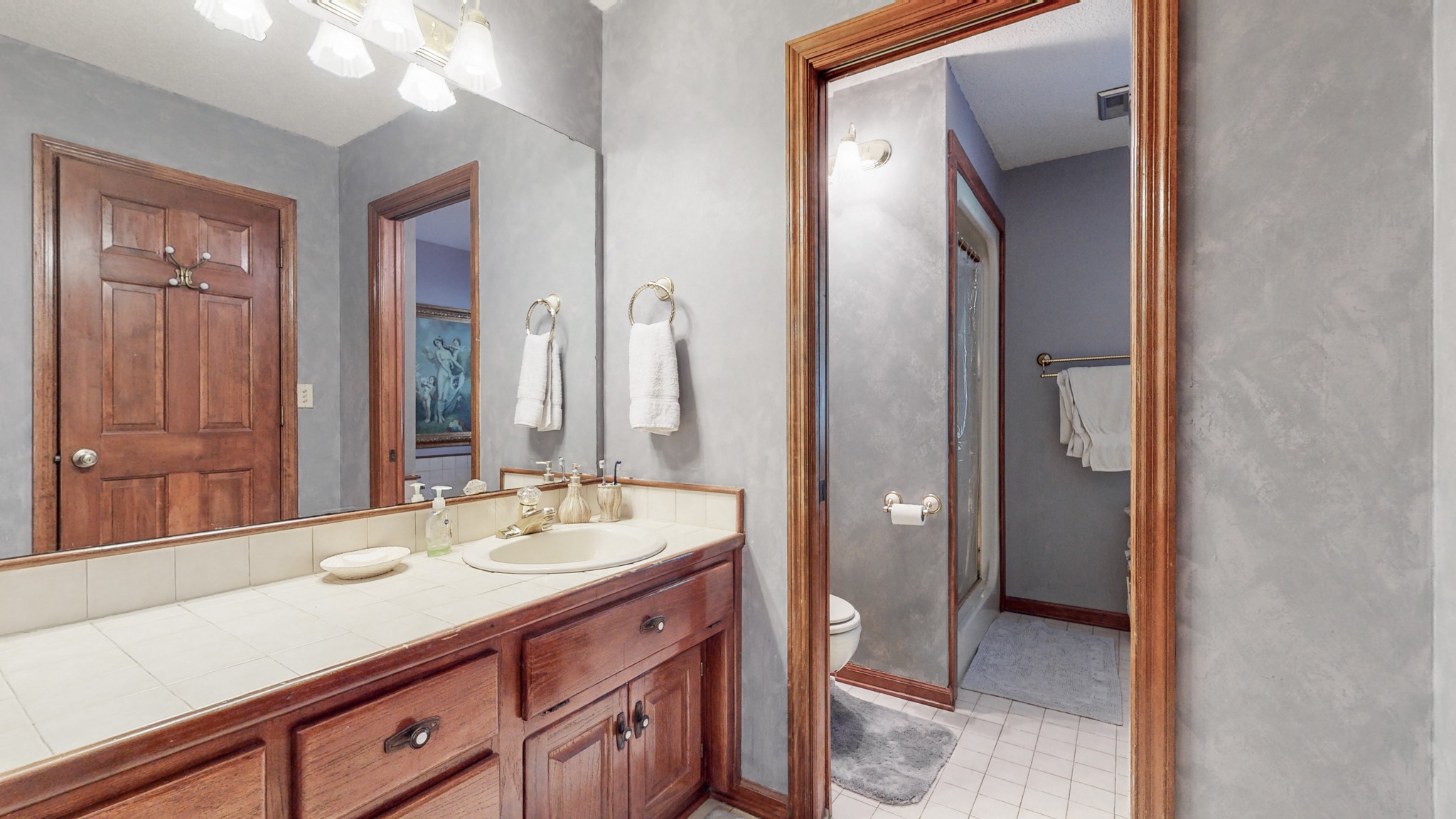 85 Sarvis Ridge Road Normandy, TN 37360 - Photo 21 of 47 a bathroom with a double vanity sink and a mirror