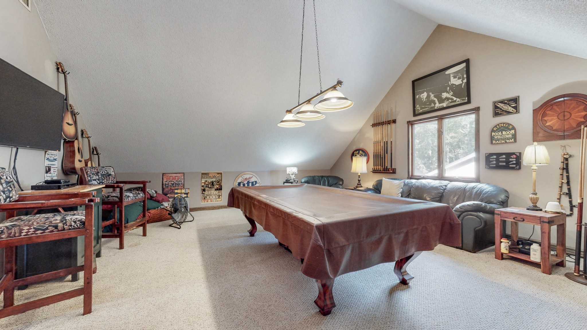 85 Sarvis Ridge Road Normandy, TN 37360 - Photo 35 of 47 a spacious bedroom with a bed table chair and a large mirror