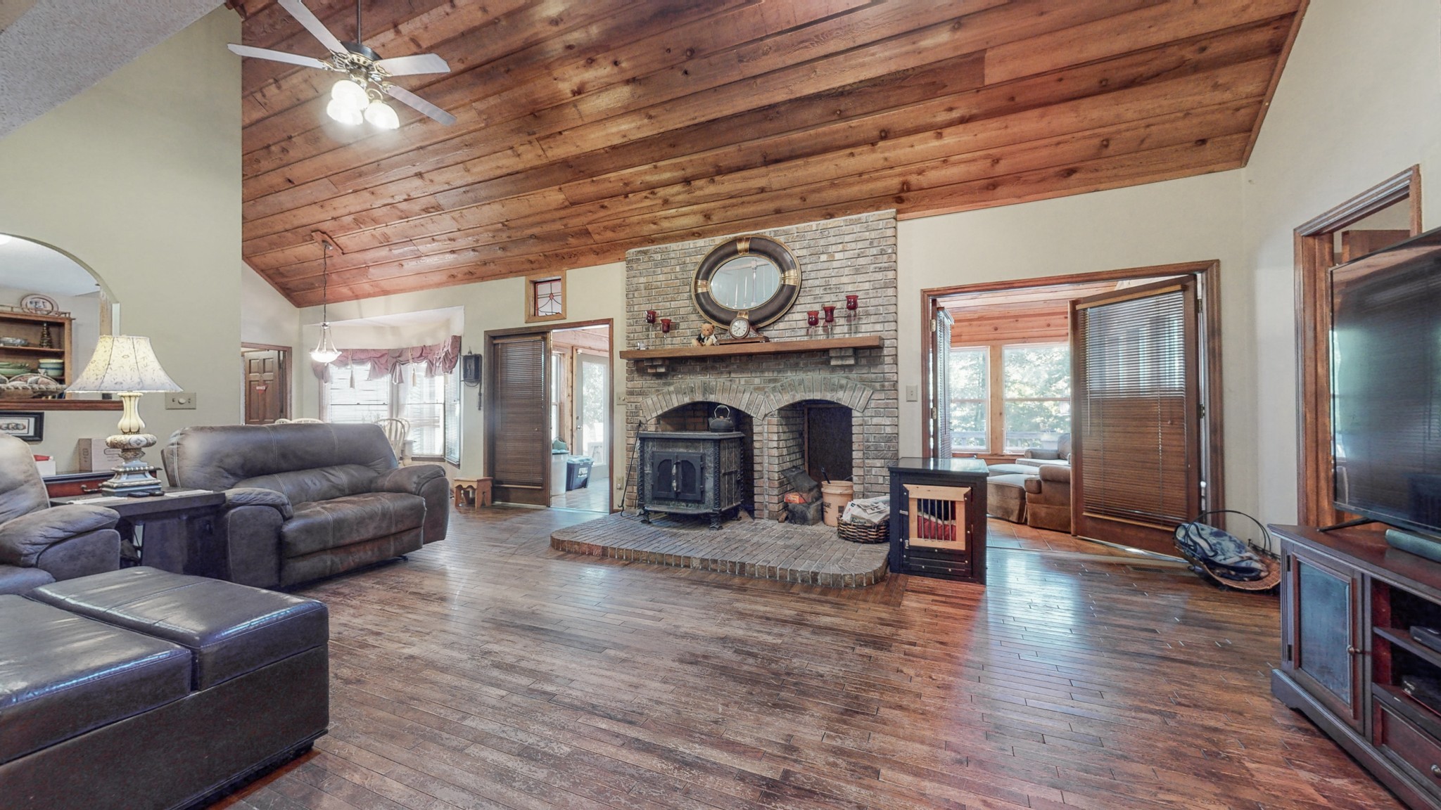 85 Sarvis Ridge Road Normandy, TN 37360 - Photo 4 of 47 a living room with furniture flat screen tv and a fireplace