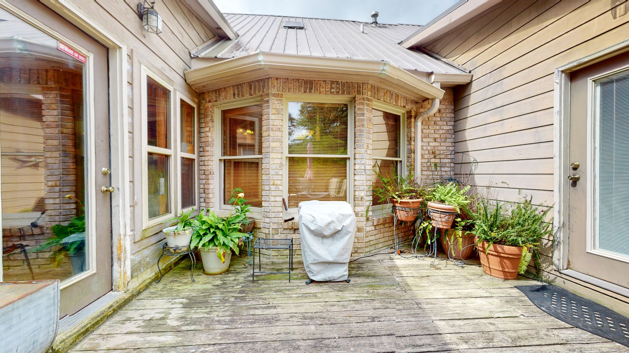 85 Sarvis Ridge Road Normandy, TN 37360 - Photo 41 of 47 a view of a lobby with chair and potted plants