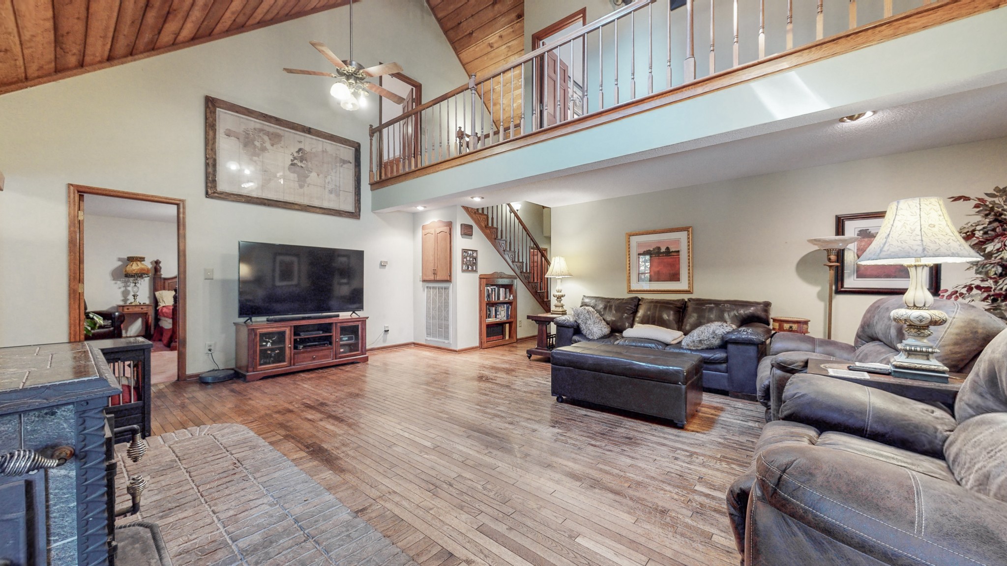 85 Sarvis Ridge Road Normandy, TN 37360 - Photo 5 of 47 a living room with furniture a flat screen tv and kitchen view
