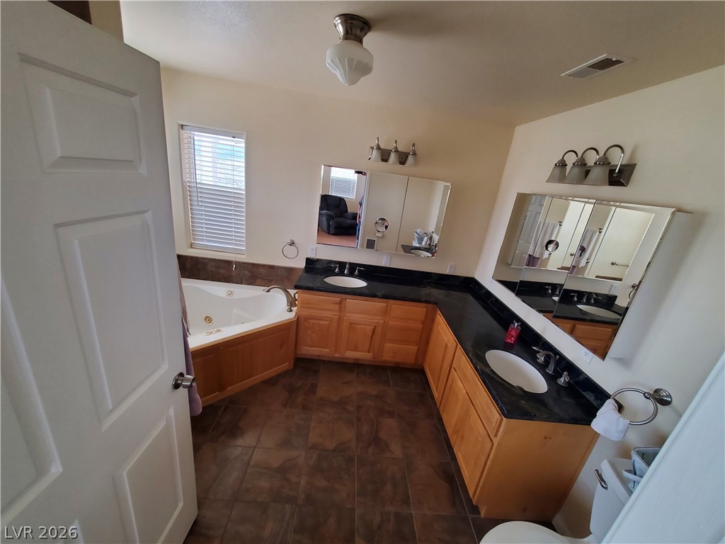5272 Truman Lane Caliente, NV 89008 - Photo 15 of 43 Full bath with a jetted tub and double vanity