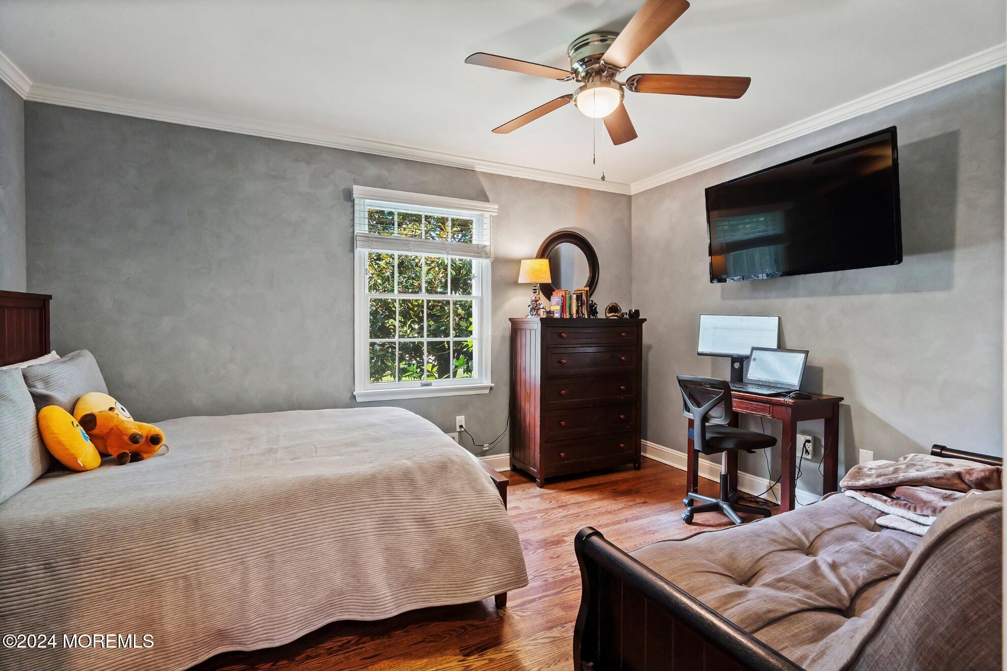 5 Adams Drive Brick, NJ 08724 - Photo 11 of 15 a bedroom with a bed and a flat screen tv