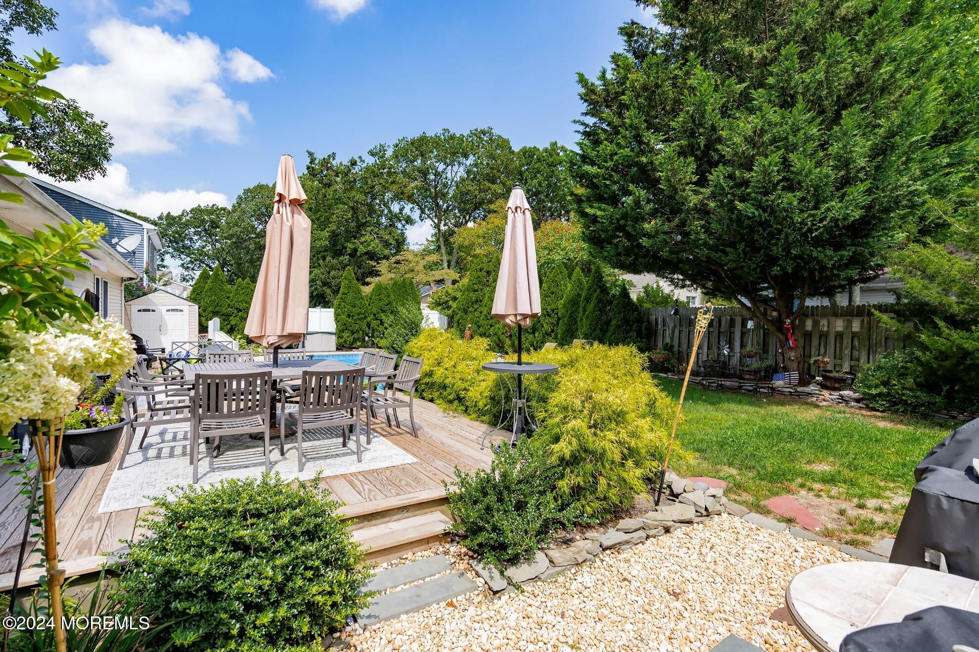 5 Adams Drive Brick, NJ 08724 - Photo 3 of 15 a view of a sitting area with furniture and garden