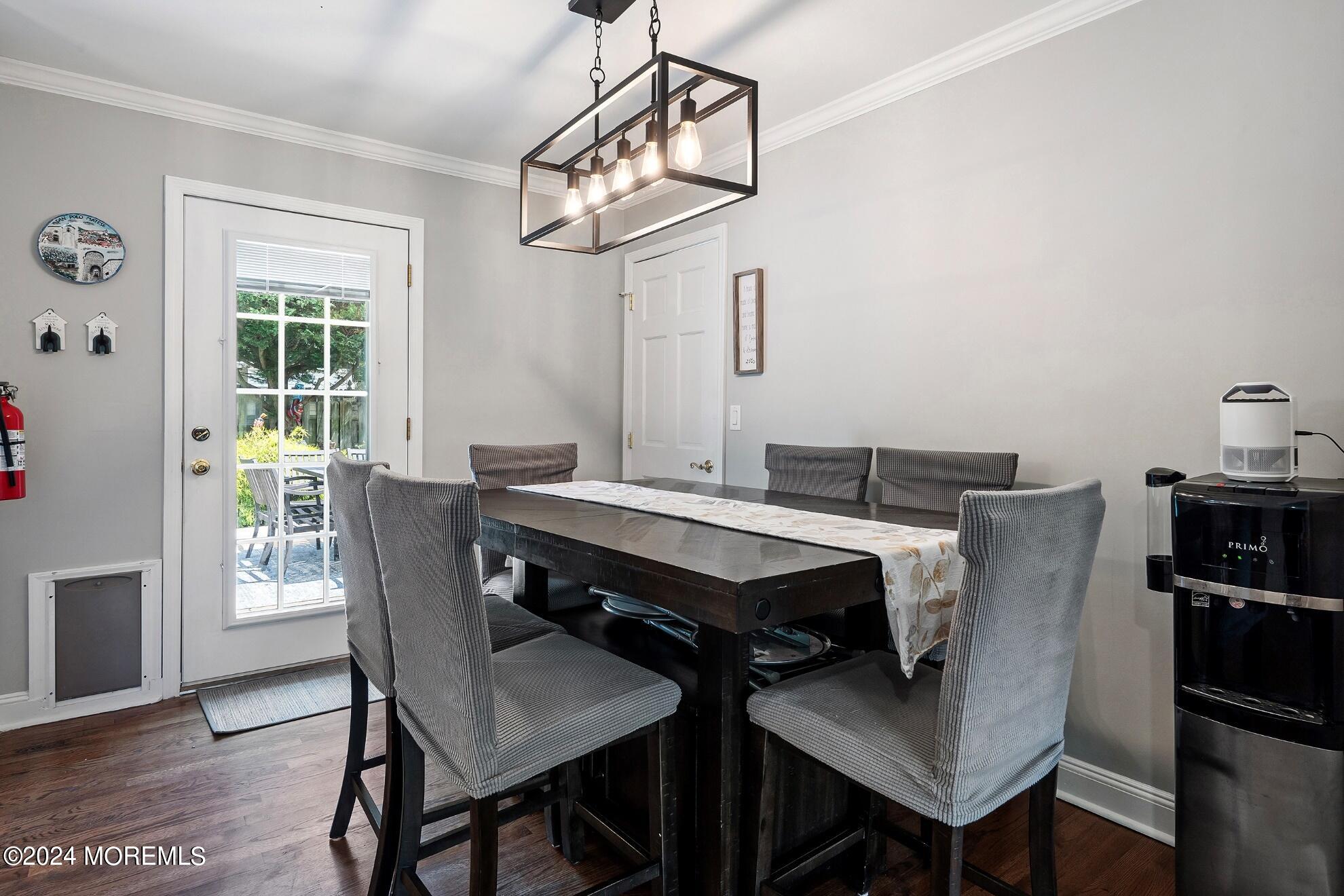 5 Adams Drive Brick, NJ 08724 - Photo 6 of 15 a view of a dining room with furniture window and wooden floor