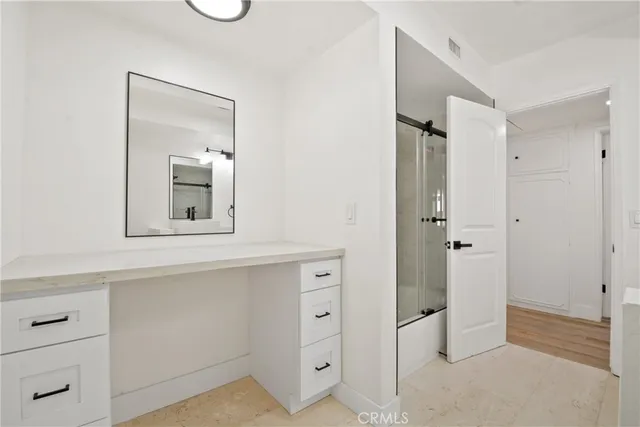 a view of a hallway with closet