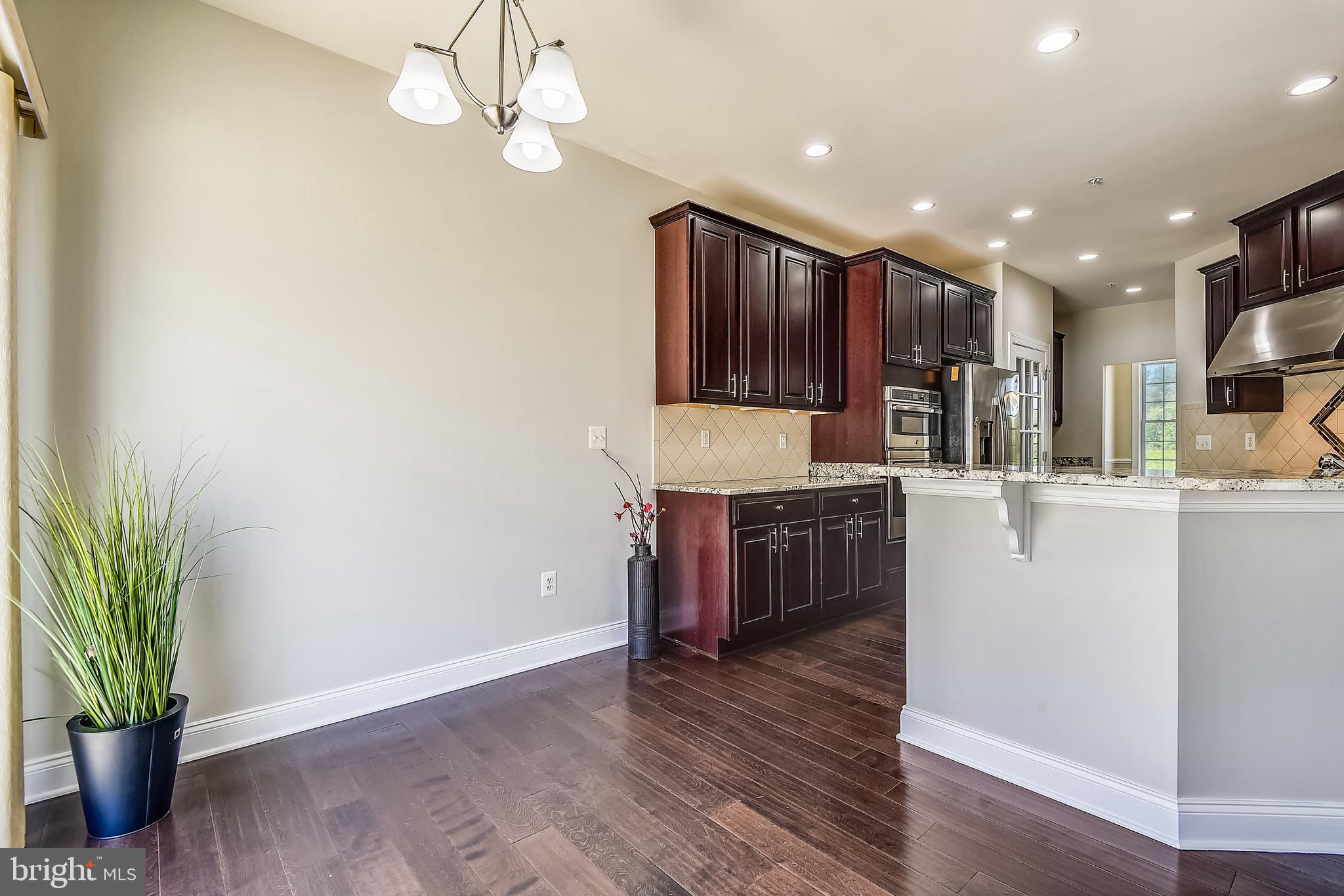 7670 Elmcrest Road Hanover, MD 21076 - Photo 18 of 70 ML: Breakfast area off of Kitchen