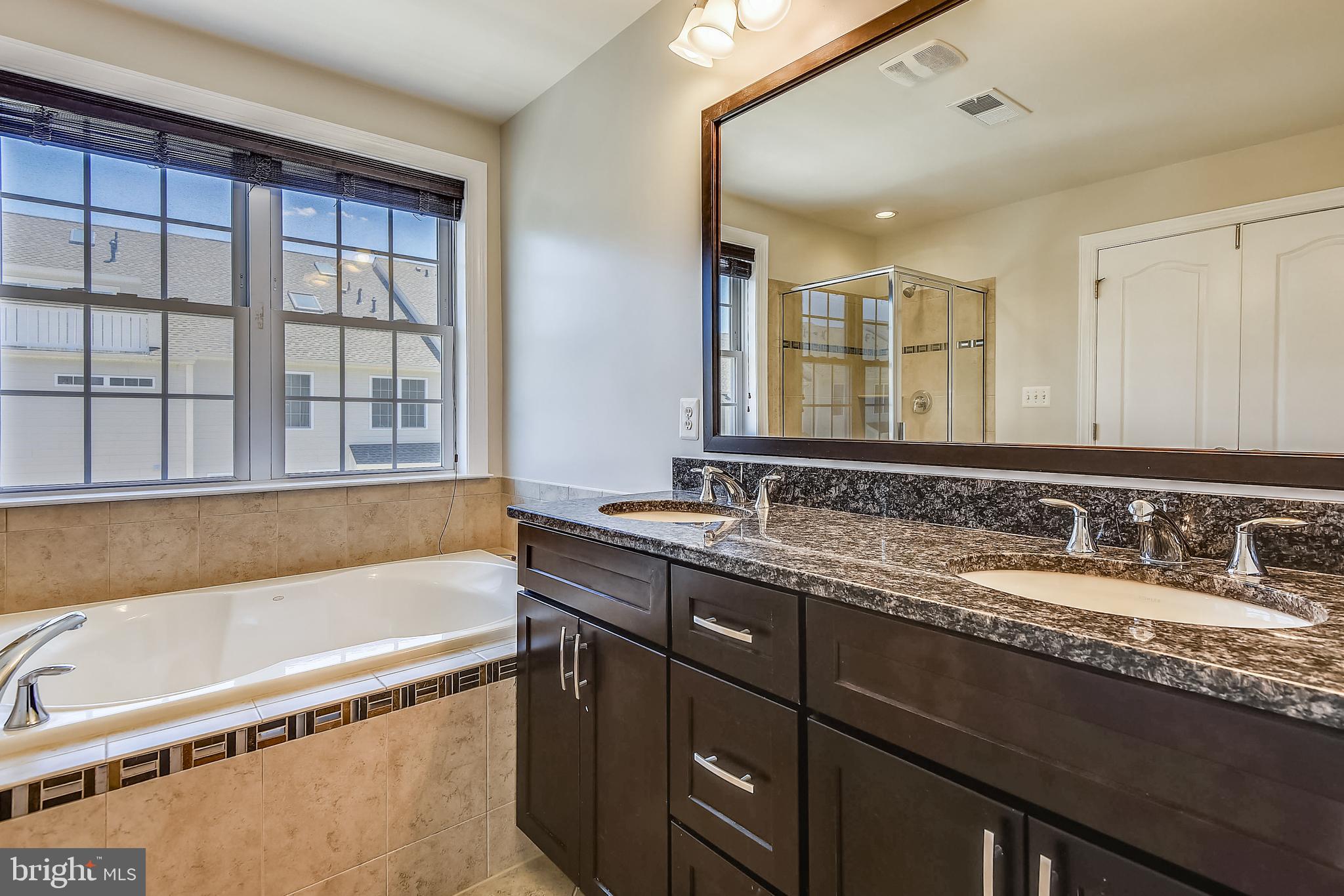 7670 Elmcrest Road Hanover, MD 21076 - Photo 28 of 70 UL: Master Bath with Tub & Separate Shower