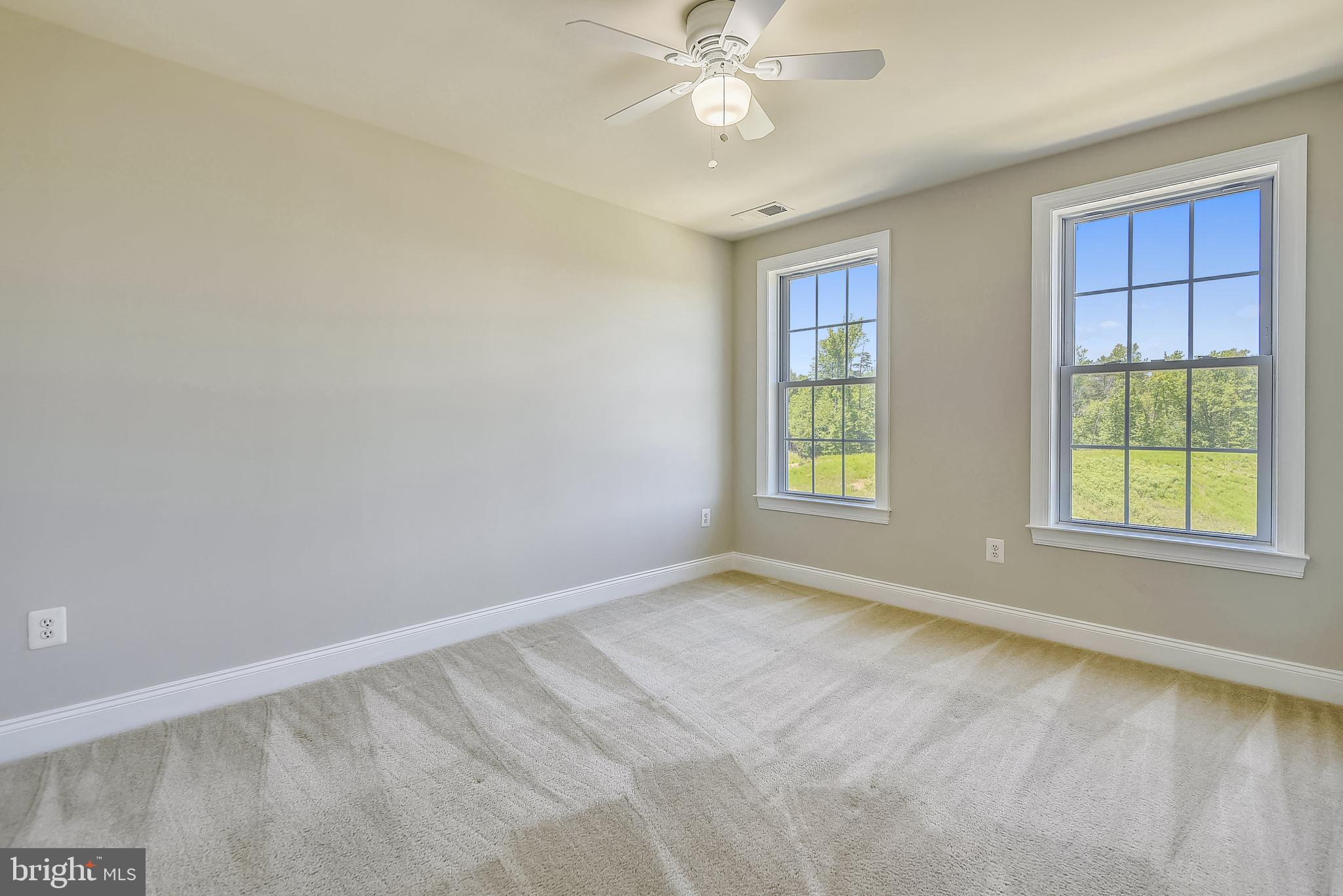 7670 Elmcrest Road Hanover, MD 21076 - Photo 32 of 70 UL: Front Bedroom with Ceiling Fan