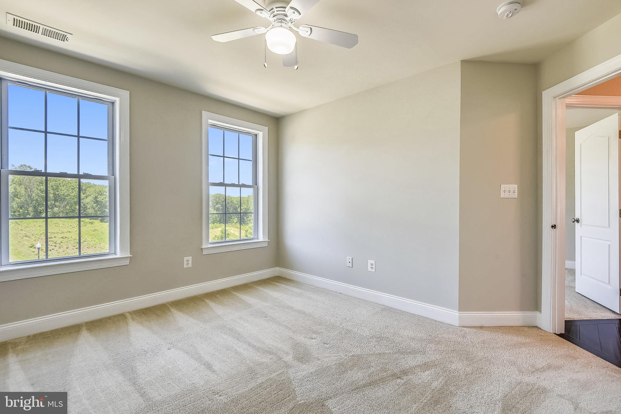 7670 Elmcrest Road Hanover, MD 21076 - Photo 33 of 70 UL: Right Front Bedroom with Ceiling Fan