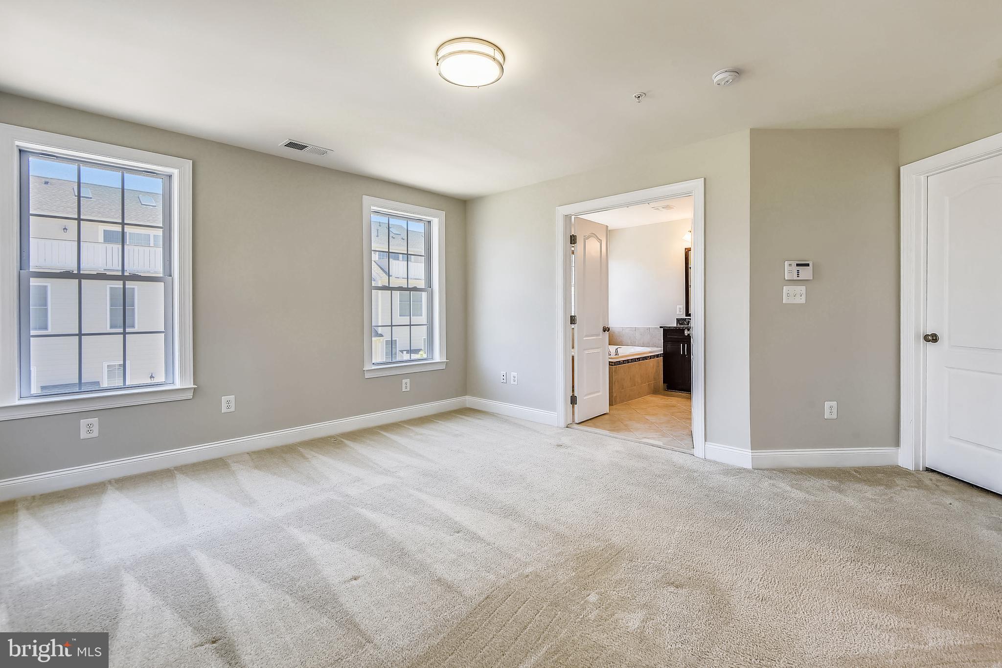 7670 Elmcrest Road Hanover, MD 21076 - Photo 40 of 70 UL: Master Bedroom with Luxury Bath &Walkin Closet