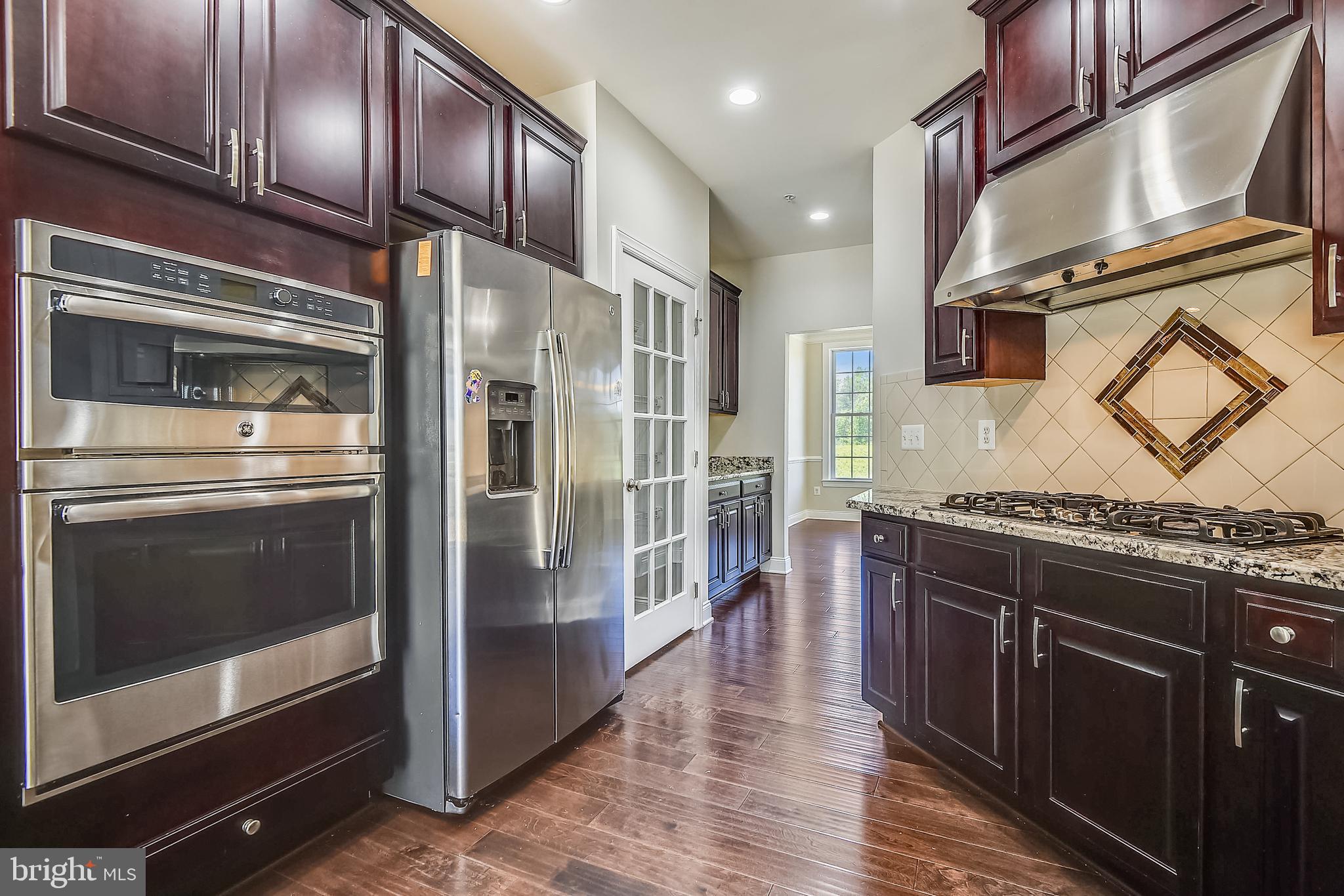 7670 Elmcrest Road Hanover, MD 21076 - Photo 7 of 70 ML: Wall Oven, Microwave, 2-Door Refrigerator,