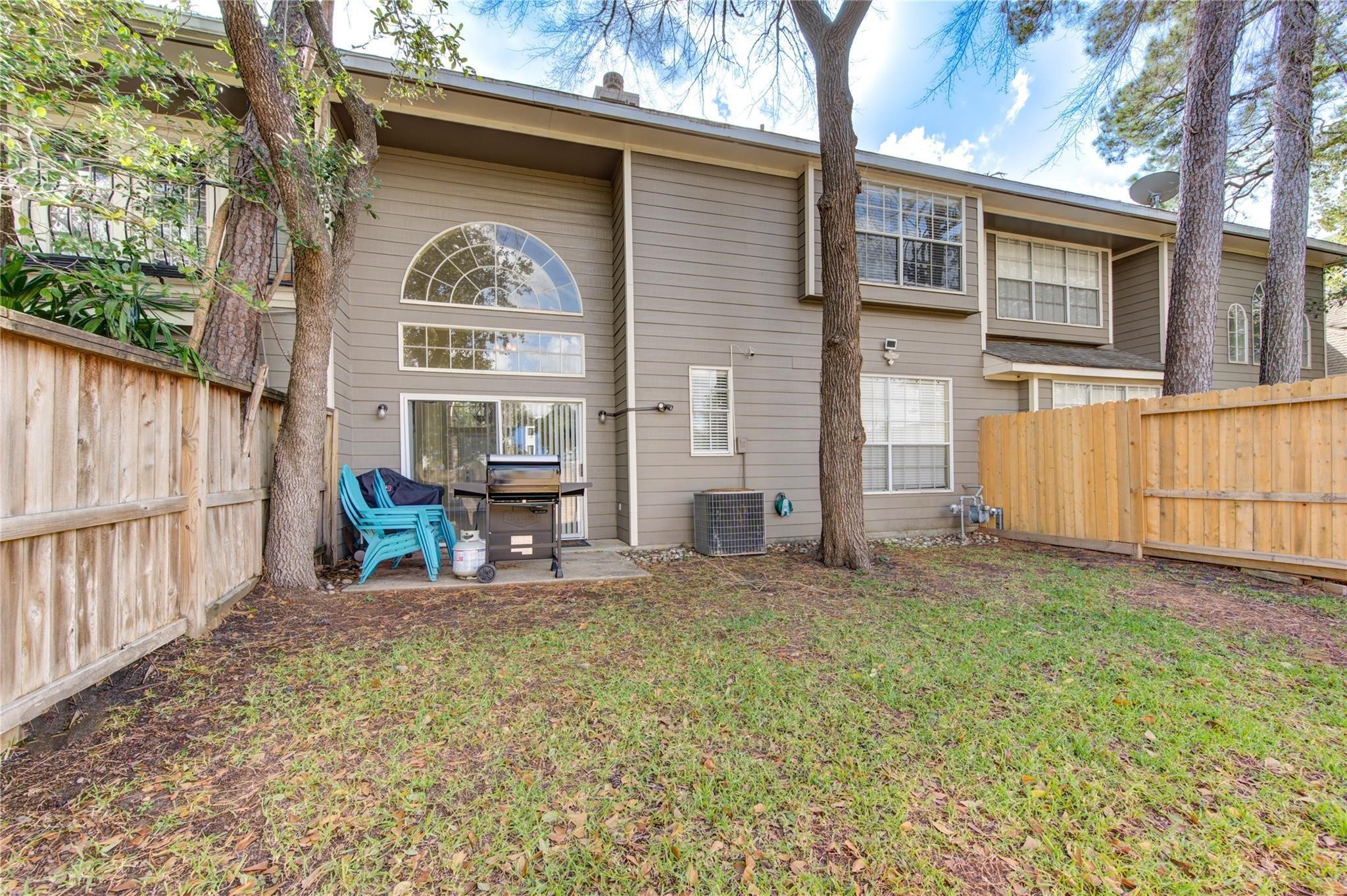 14420 Walters Road, Unit 58 Houston, TX 77014 - Photo 28 of 30 a view of a house with backyard and sitting area