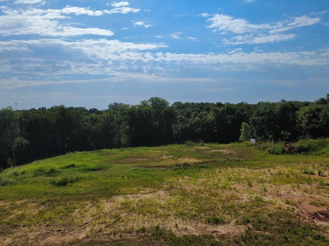 Pleasant Ridge Jones, OK 73049 - Photo 20 of 21 Expansive land parcel featuring natural terrain and a backdrop of mature trees