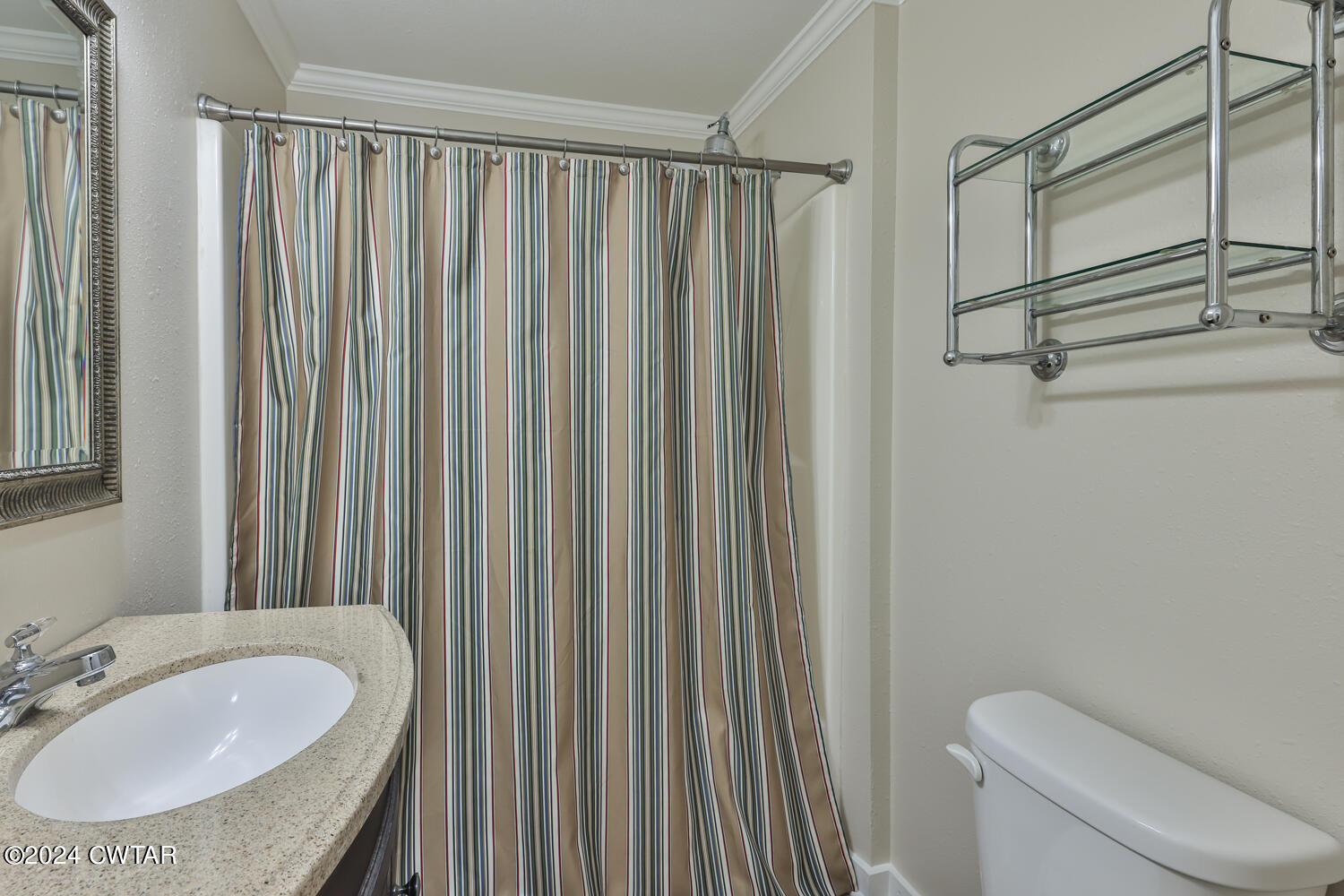 246 Thomas Street Dyer, TN 38330 - Photo 13 of 19 a bathroom with a granite countertop sink and a mirror