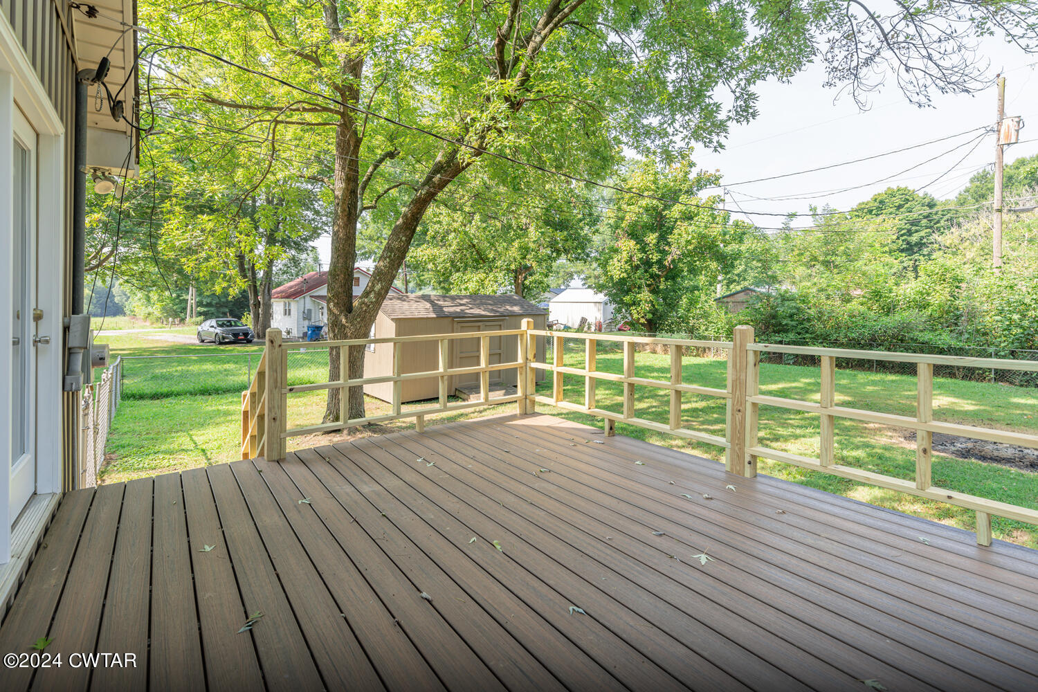 246 Thomas Street Dyer, TN 38330 - Photo 18 of 19 a view of a house with a yard