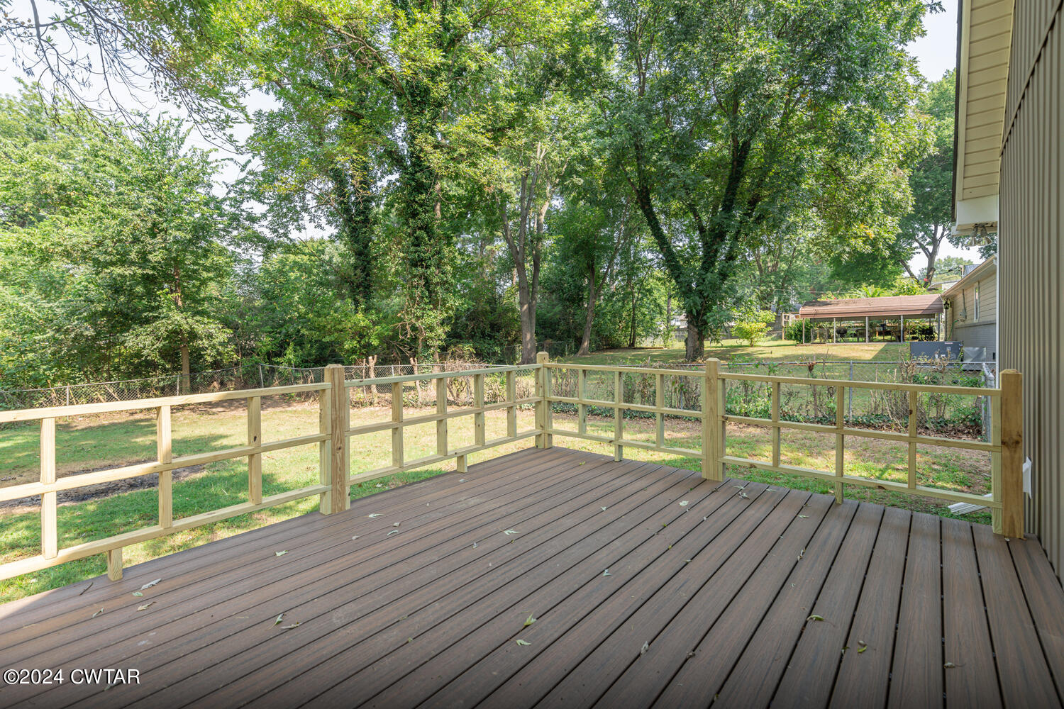 246 Thomas Street Dyer, TN 38330 - Photo 19 of 19 a view of deck with wooden floor and fence