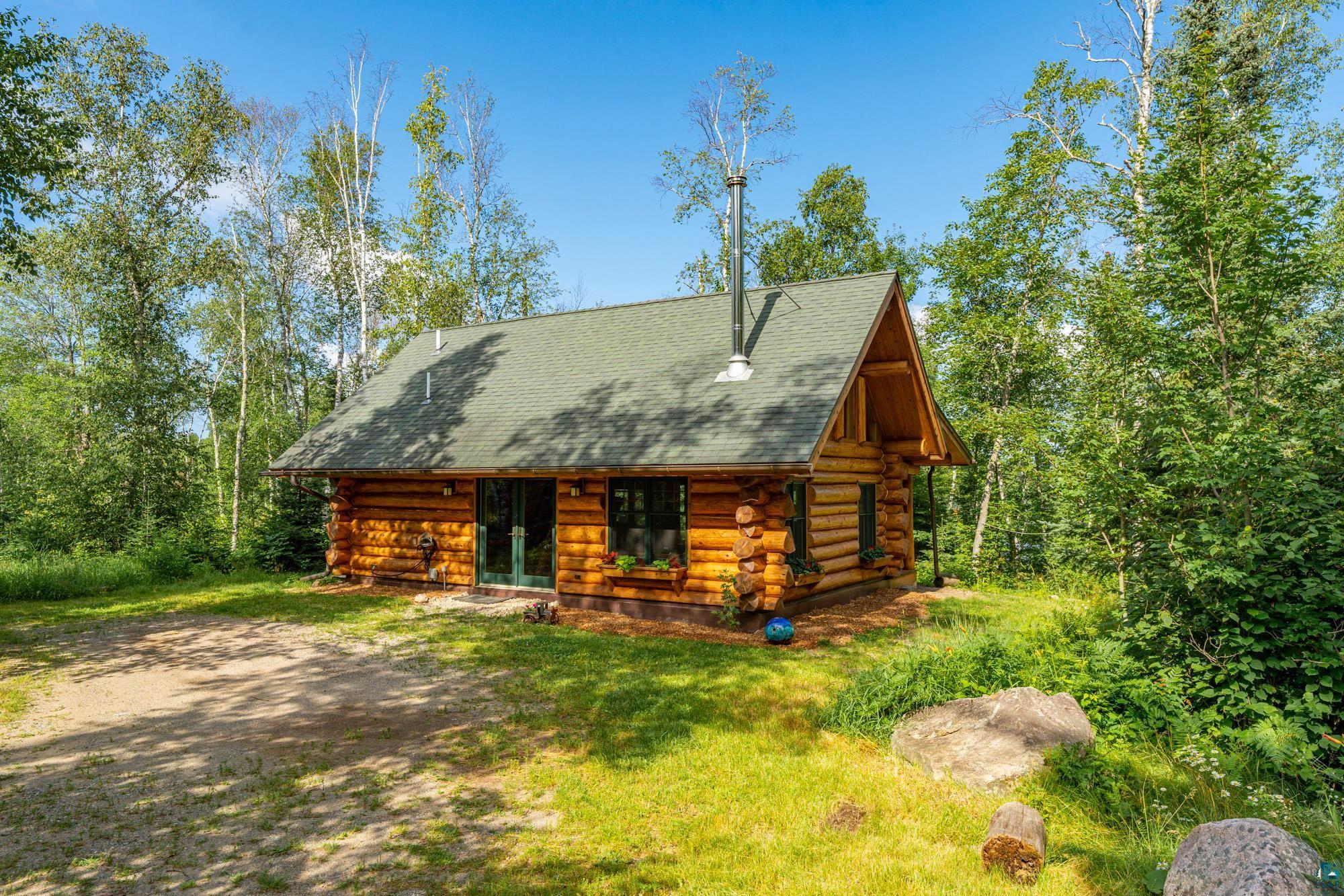 1911 Grouse Ridge Road Ely, MN 55731 - Photo 25 of 42 Exterior space with a yard