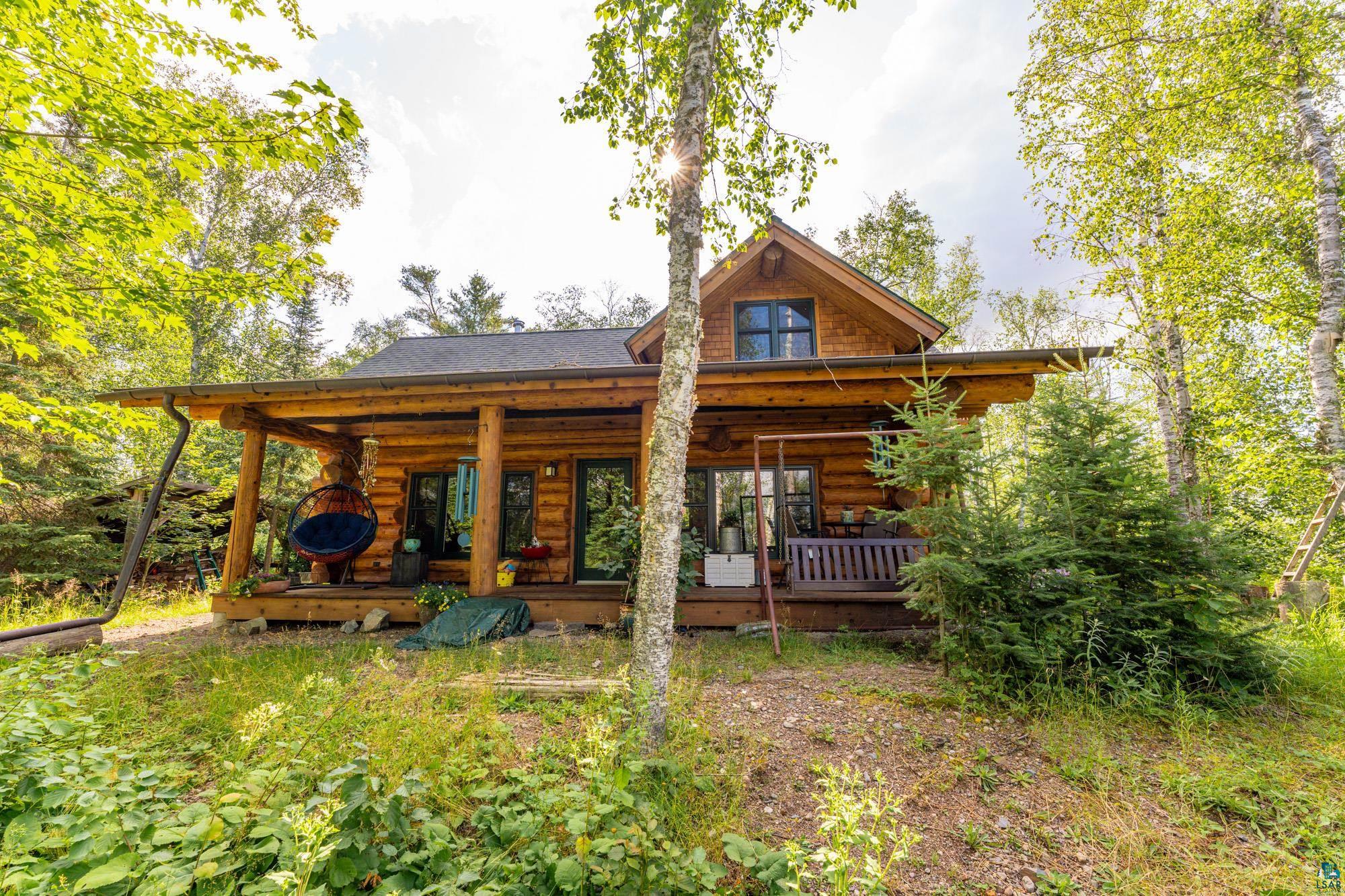 1911 Grouse Ridge Road Ely, MN 55731 - Photo 3 of 42 Back of house with covered porch