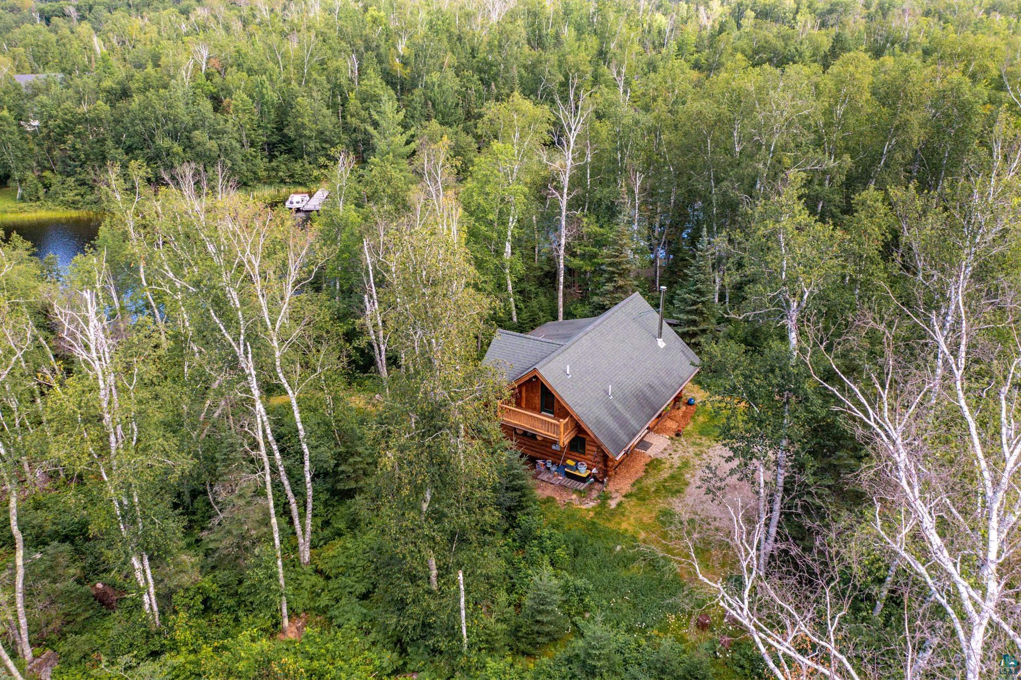 1911 Grouse Ridge Road Ely, MN 55731 - Photo 40 of 42 Drone / aerial view featuring a water view