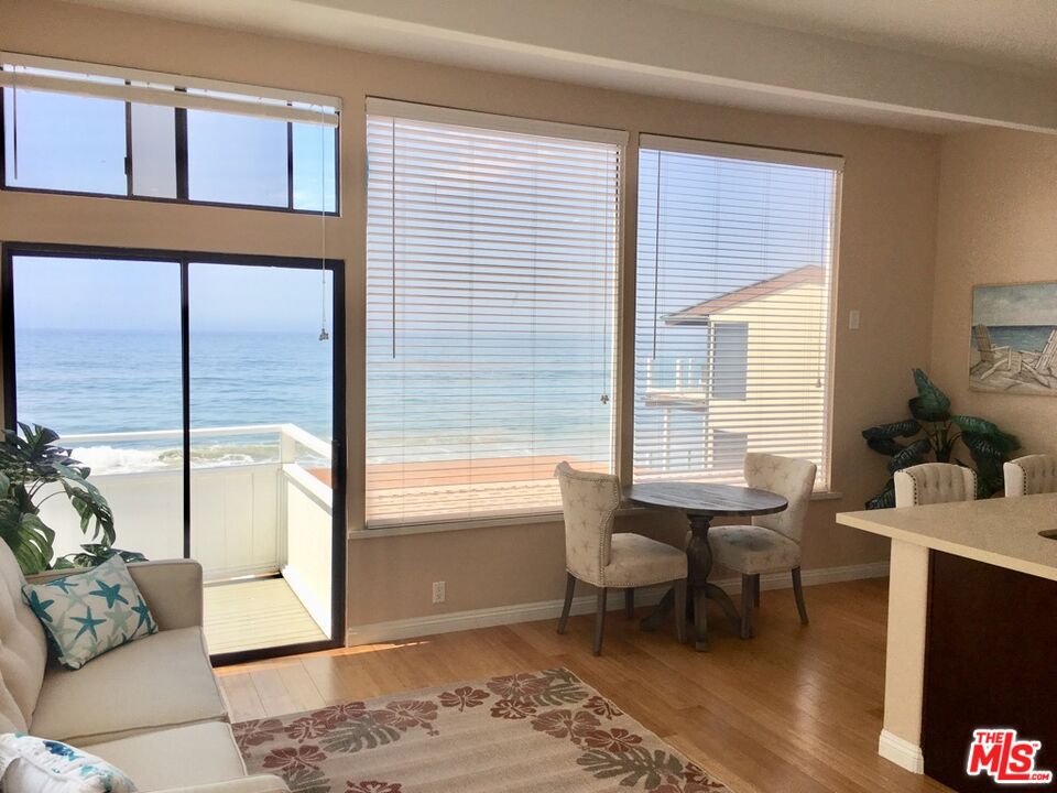 25164 Malibu Road, Unit D Malibu, CA 90265 - Photo 6 of 24 a living room with furniture and a window