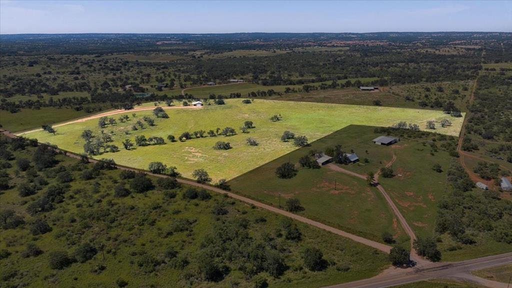 4773 Behrens School Road Fredonia, TX 76842 - Photo 2 of 27 an aerial view of a house with a yard