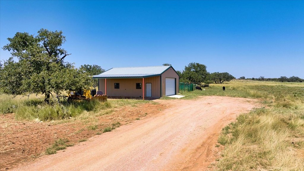 4773 Behrens School Road Fredonia, TX 76842 - Photo 7 of 27 a front view of a house with a yard