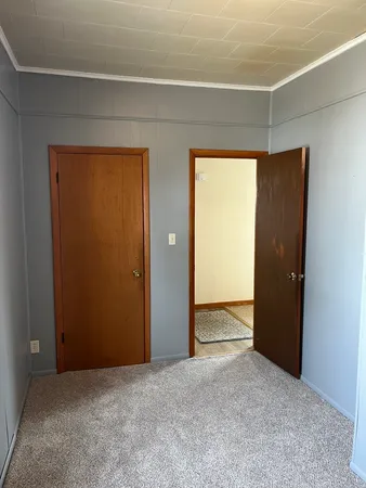 an empty room with a door