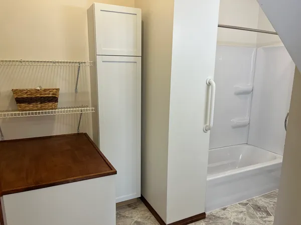 a bathroom with a bathtub