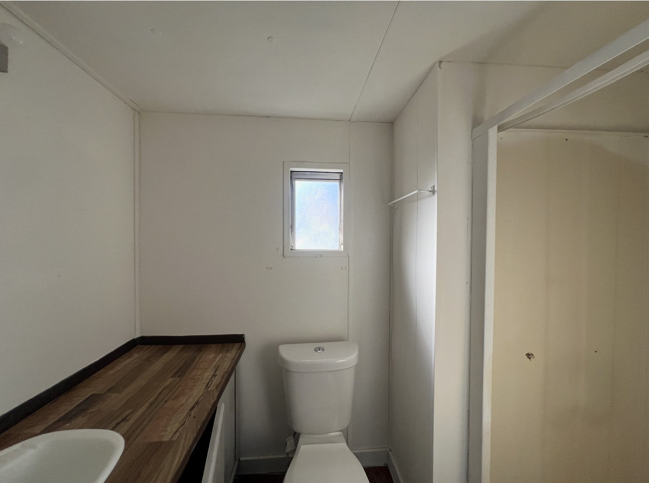 1511-1 Jones Street, Unit 1 Rosenberg, TX 77471 - Photo 12 of 13 a bathroom with a toilet