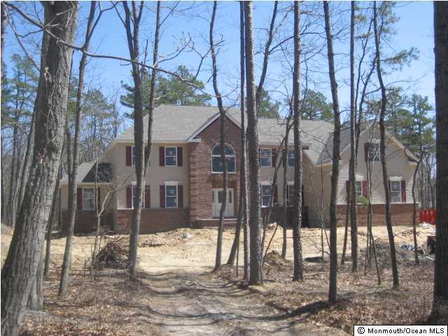 1 Brookside Road Millstone Township, NJ 08510 - Photo 3 of 3 a view of a house with a yard