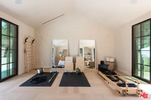 a living room with furniture and a bathtub