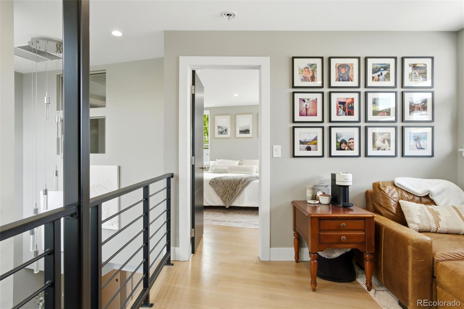 999 South Fillmore Way Denver, CO 80209 - Photo 24 of 37 a bedroom with furniture and a window