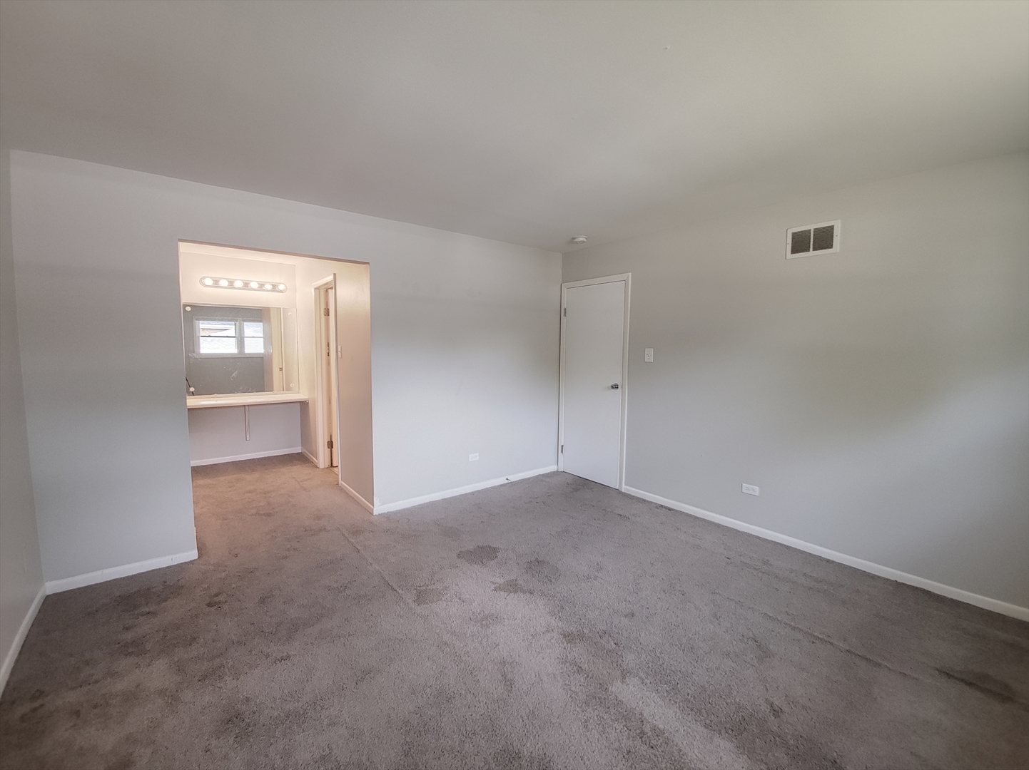 6037 Spring Lane Matteson, IL 60443 - Photo 17 of 29 a view of an empty room with a window