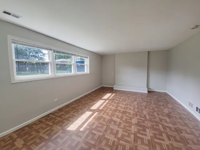 a bathroom with a sink toilet and vanity