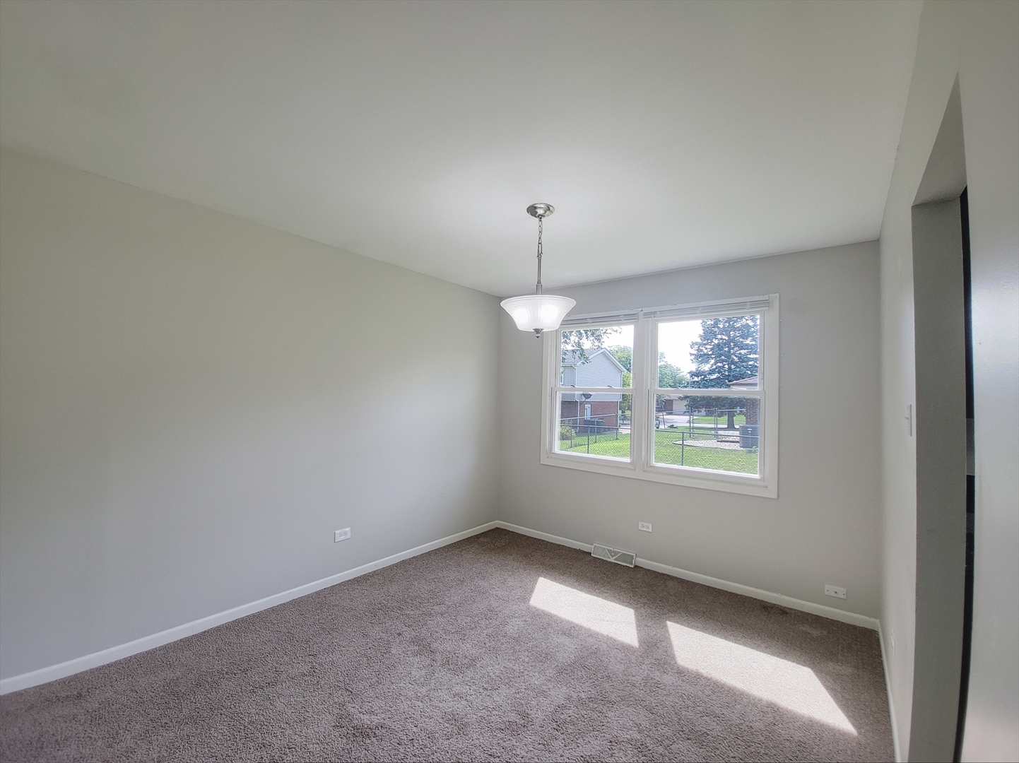 6037 Spring Lane Matteson, IL 60443 - Photo 5 of 29 an empty room with a window