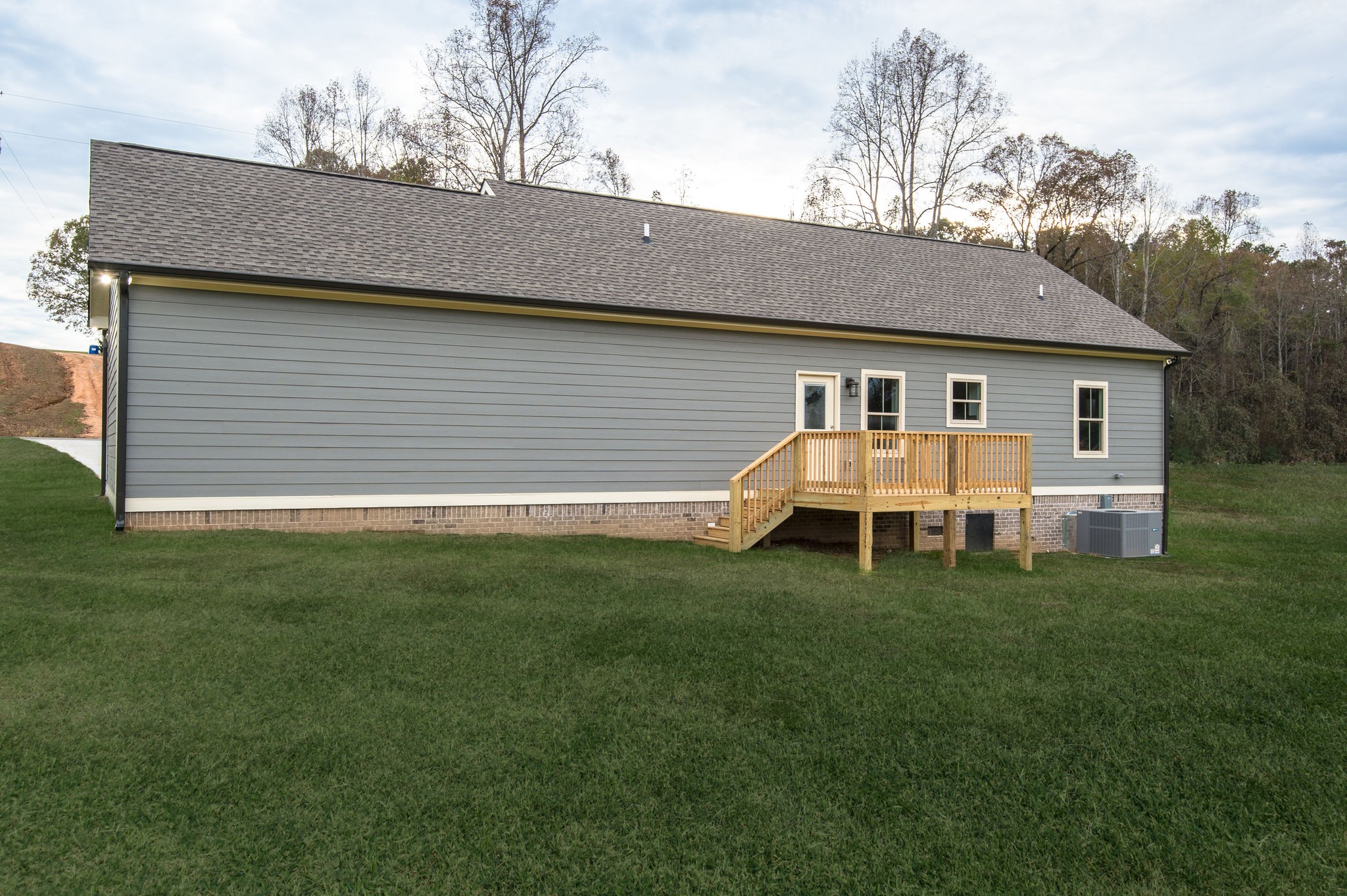 895 Goslin Branch Road Burns, TN 37029 - Photo 26 of 30 a view of a yard with a house and garden