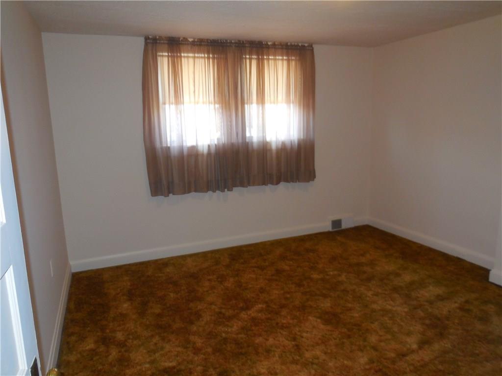 933 Indiana Avenue Monaca, PA 15061 - Photo 11 of 19 2nd bedroom has its own closet and door to connect to 3rd bedroom.