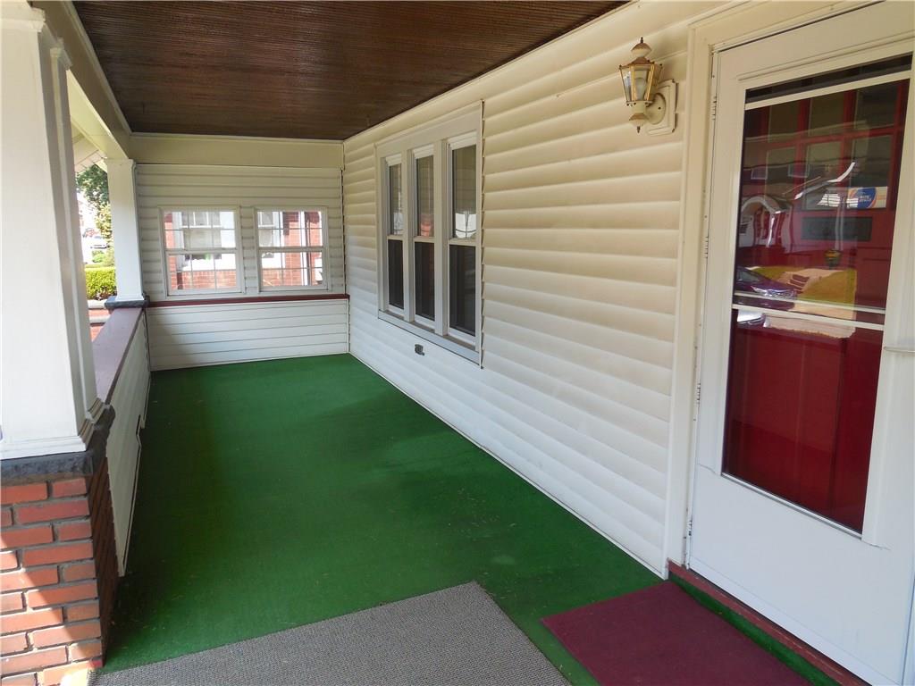 933 Indiana Avenue Monaca, PA 15061 - Photo 18 of 19 Enjoy many warm summer nights and cool days on the over-sized covered front porch.