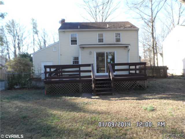 11124 Granada Road Richmond, VA 23235 - Photo 2 of 8 a view of a house with a yard