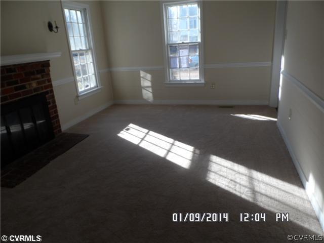 11124 Granada Road Richmond, VA 23235 - Photo 4 of 8 a view of an empty room and window