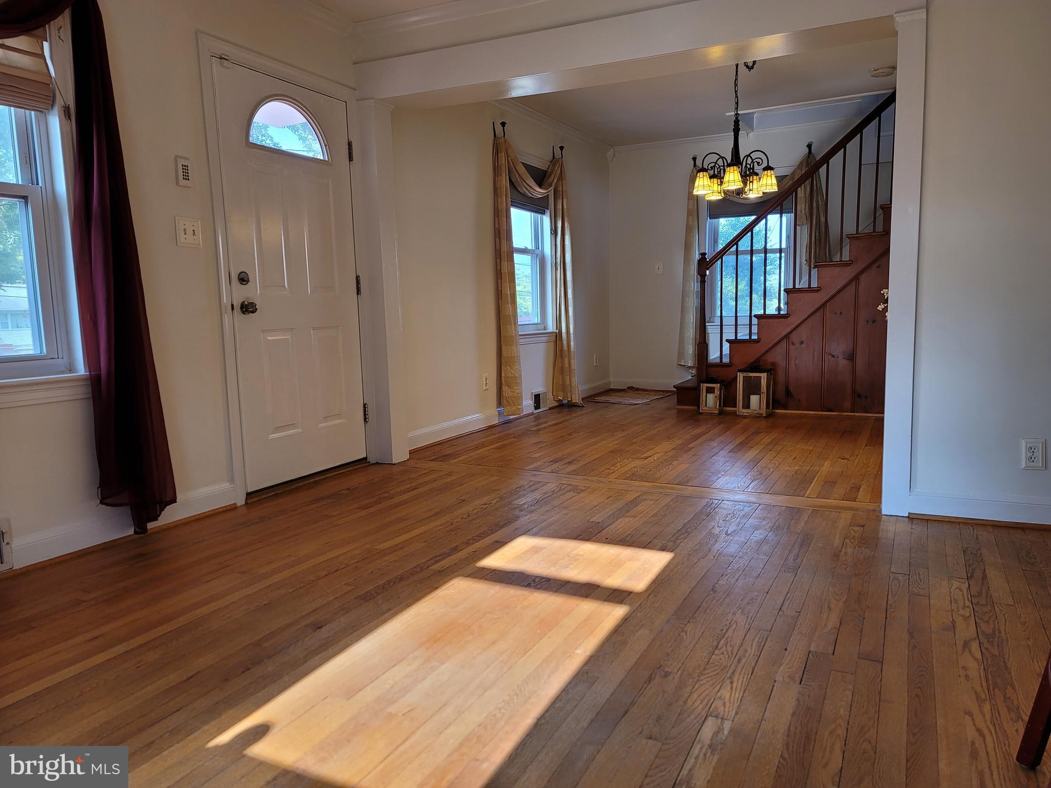 1015 Veirs Mill Road Rockville, MD 20851 - Photo 11 of 57 a view of an entryway with wooden floor