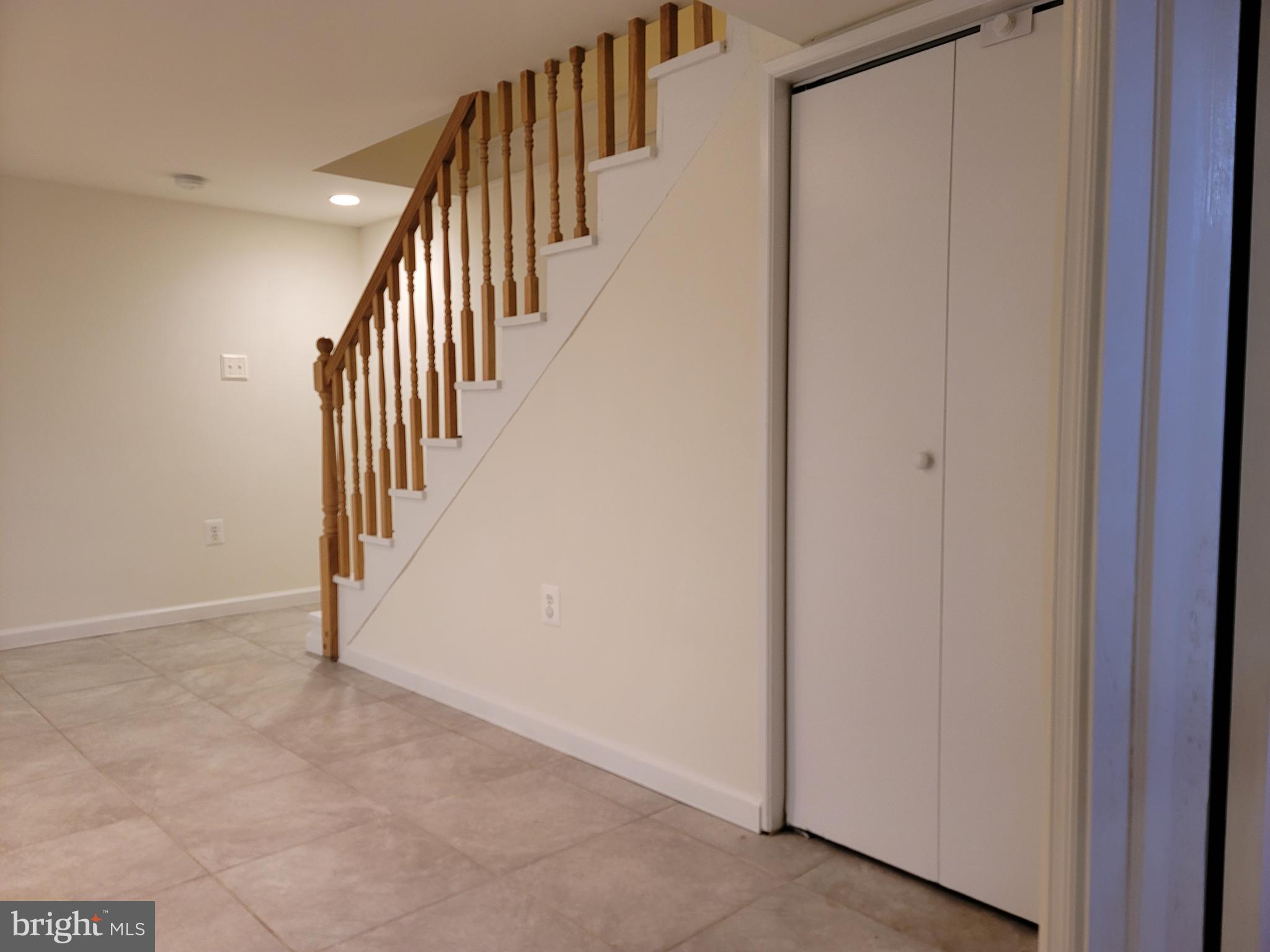 1015 Veirs Mill Road Rockville, MD 20851 - Photo 24 of 57 a view of a hallway with wooden floor and entryway